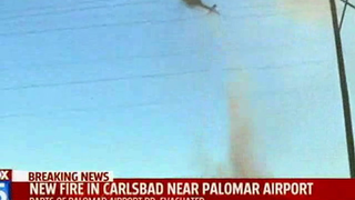 Moron Takes Selfie With Carlsbad Wildfire